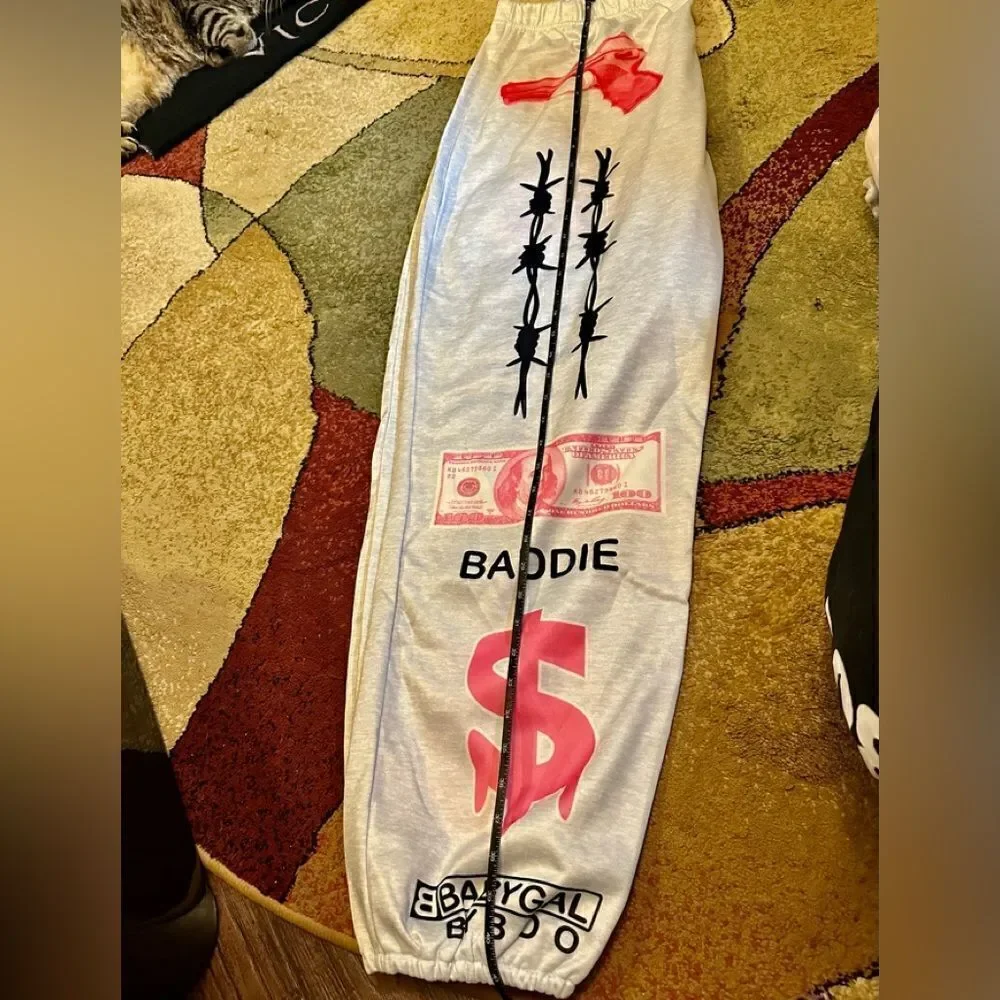 Y2K Printed joggers. Elastic at the ankle letter print with pockets. . Polyester